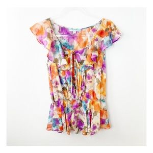 Pleione Floral Ruffled Neck Peplum Sleeveless Top